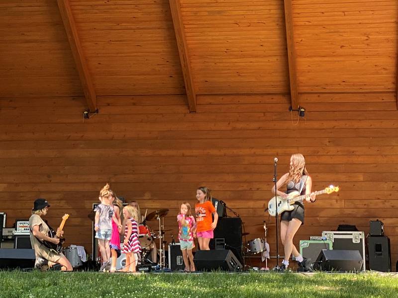 Brooklyn-based punk band Thick invites children on-stage to rock out.