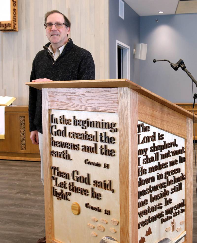 Jonathan Crail, senior pastor at the First United Methodist Church of DeKalb, Friday, Jan. 24, 2025, at the pulpit in the church.