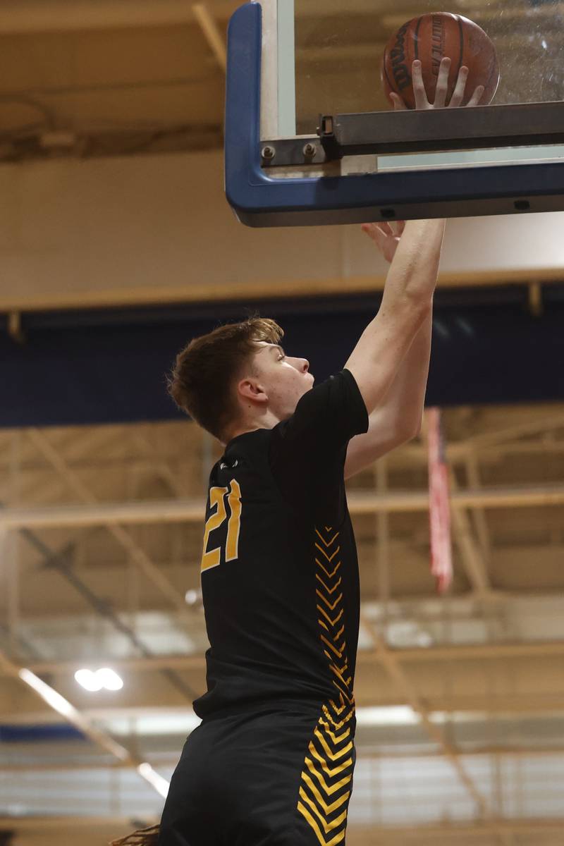 Joliet West’s Drew King goes in for the basket against Joliet Central.