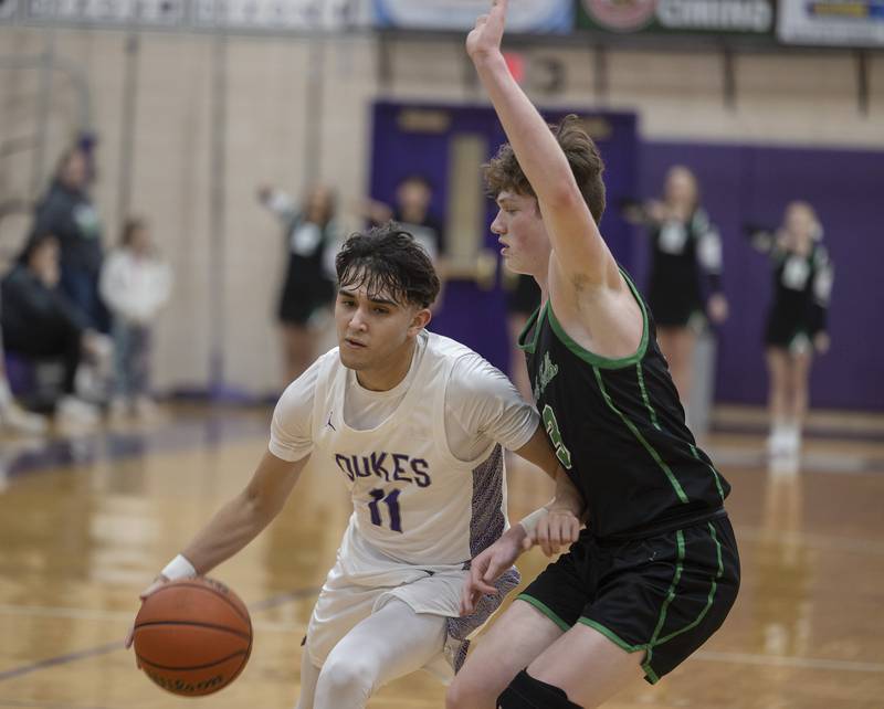 Dixon’s Wyatt Wetzell handles the ball against Rock Falls Tuesday, Feb. 7, 2023.