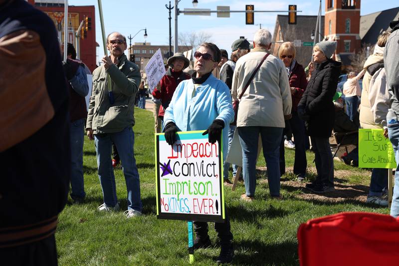 Protesters participate in the No Kings rally at the Kankakee County Courthouse on March 28, 2026.