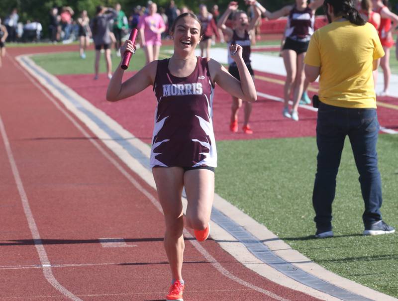 Morris's Leah Ortiz reacts after winning the 4x800 relay during the Interstate 8 Conference girls track championship on Friday, May 9, 2025 at Morris High School.
