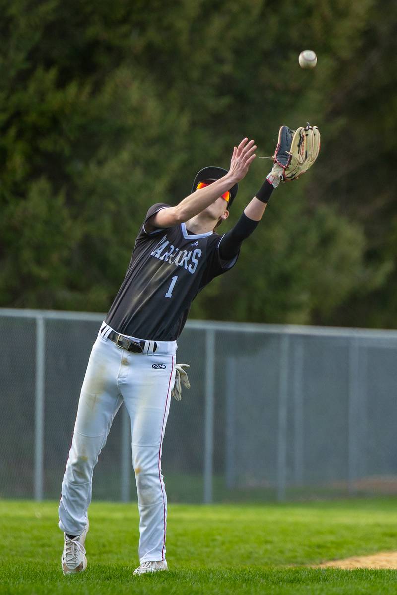 Nolan Price (1) of Woodland/Flanagan-Cornell catches fly ball on Thursday, April 17, 2025 at Woodland High School in Streator.