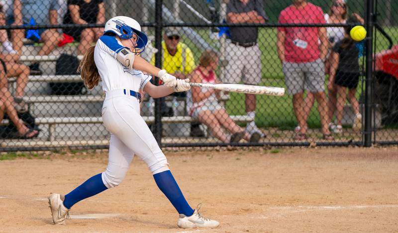 St. Charles North's Mackenzie Patterson (6) triples driving in three runs against Lake Park during a softball game at St. Charles North High School on Wednesday, May 11, 2022.