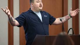 Photos: NIU employees speak out about wages at Board of Trustees meeting