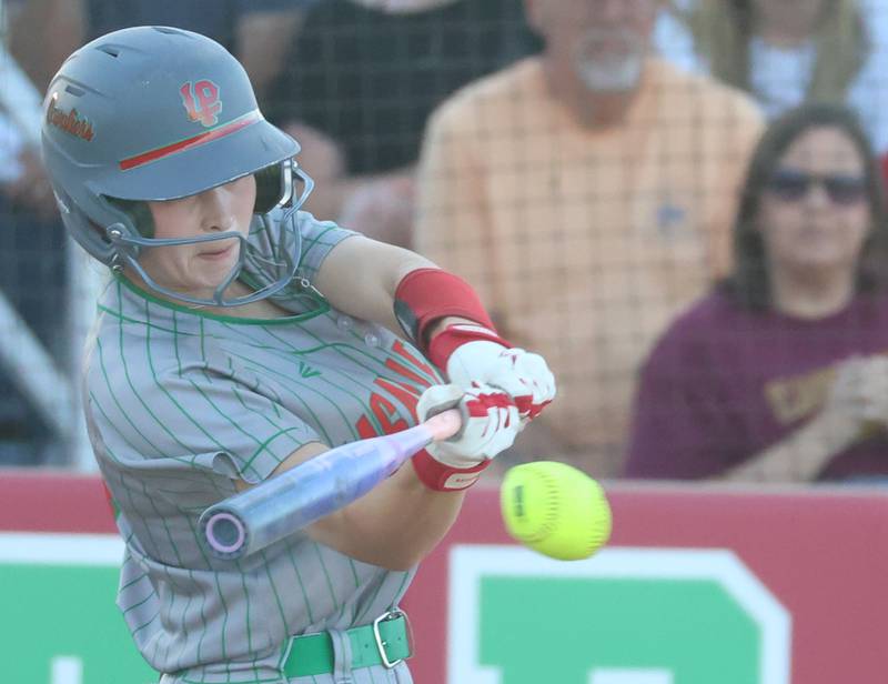L-Ps Mackenzie Chamberlain drives in a run with this hit during the Class 3A Sectional semifinal game on Tuesday, May 26, 2026 at the L-P Athletic Complex in La Salle.
