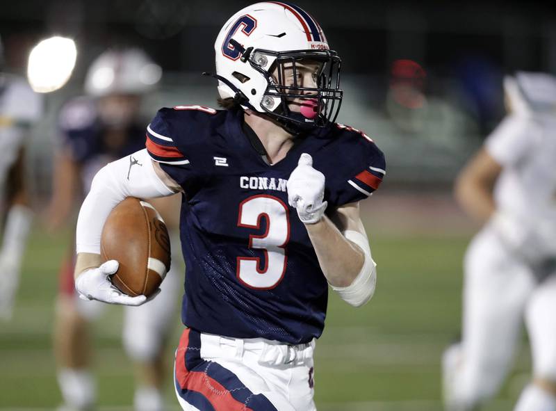 Conant's Cooper Hanson, (3) heads into the end zone against Glenbrook North Friday September 9, 2022 in Schaumburg.