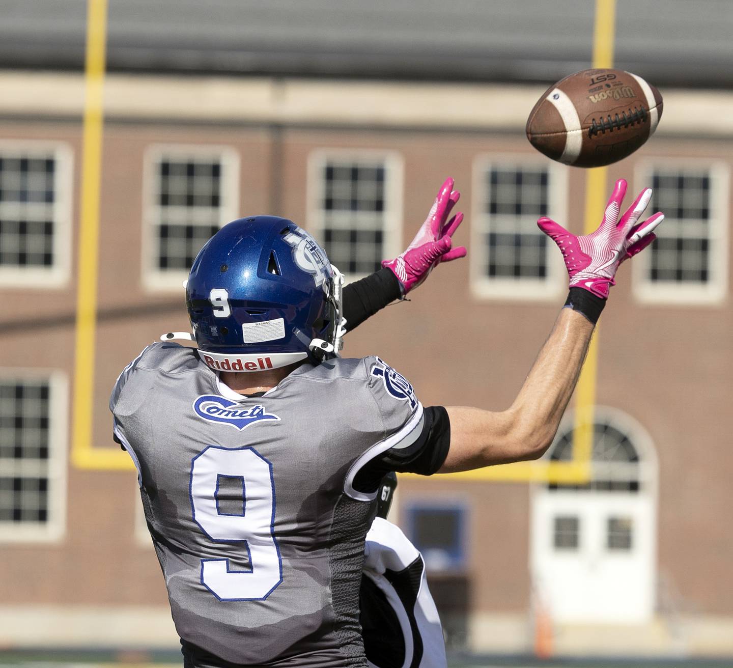 Newman’s Asher Ernst hauls in a pass for a touchdown against Kewanee Saturday, Oct. 18, 2025.