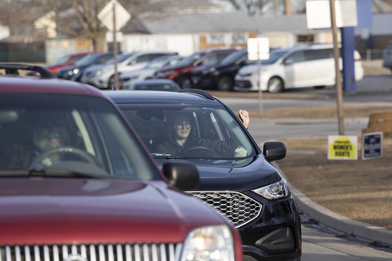 Passersby showed support or opposition as they drove by the protest Tuesday, Feb. 25, 2025, in Sterling.