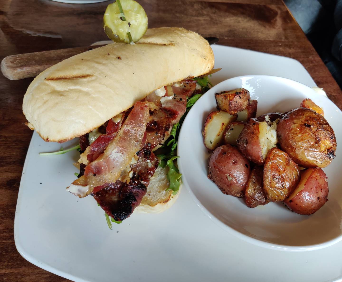 Steak sandwich, with bacon added, at The Office in St. Charles.