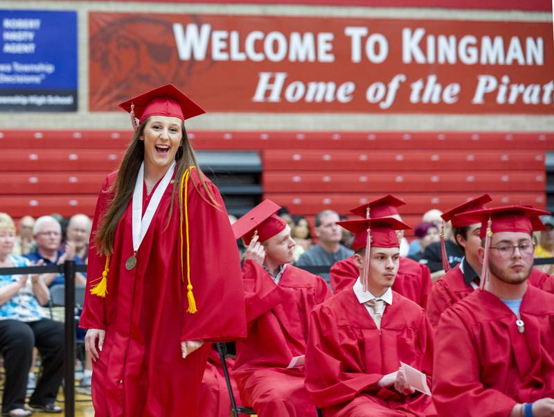 Adilyn Walker makes her way to the stage to accept the Bowermasters Scholarship for math and science Friday, May 27, 2022, during Ottawa Township High School's commencement. Walker is also class valedictorian.