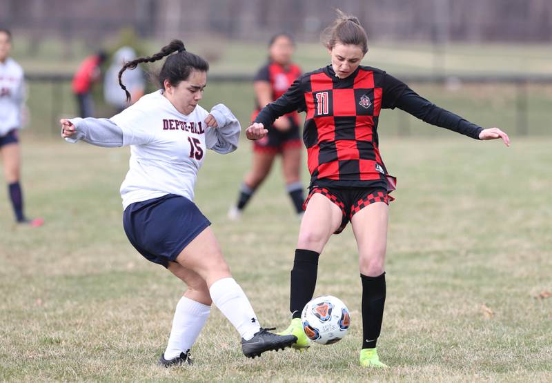 DePue's Alyssa Lopez and Indian Creek's Isabella Turner both go after the ball during their game Tuesday, April 5, 2022, at Indian Creek Middle School in Waterman.