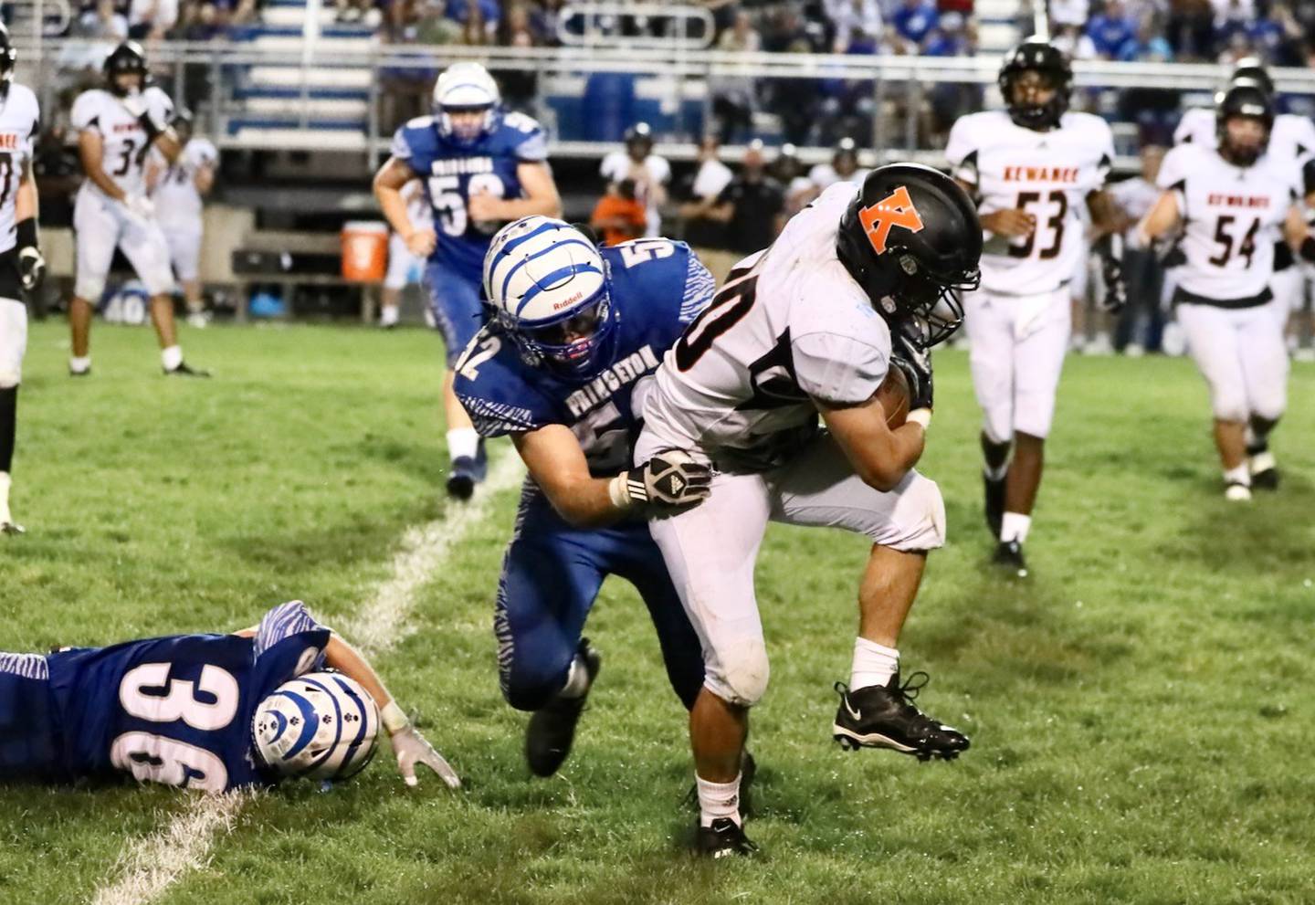 Princeton's Ian Morris makes the tackle against Kewanee Friday night at Bryant Field.