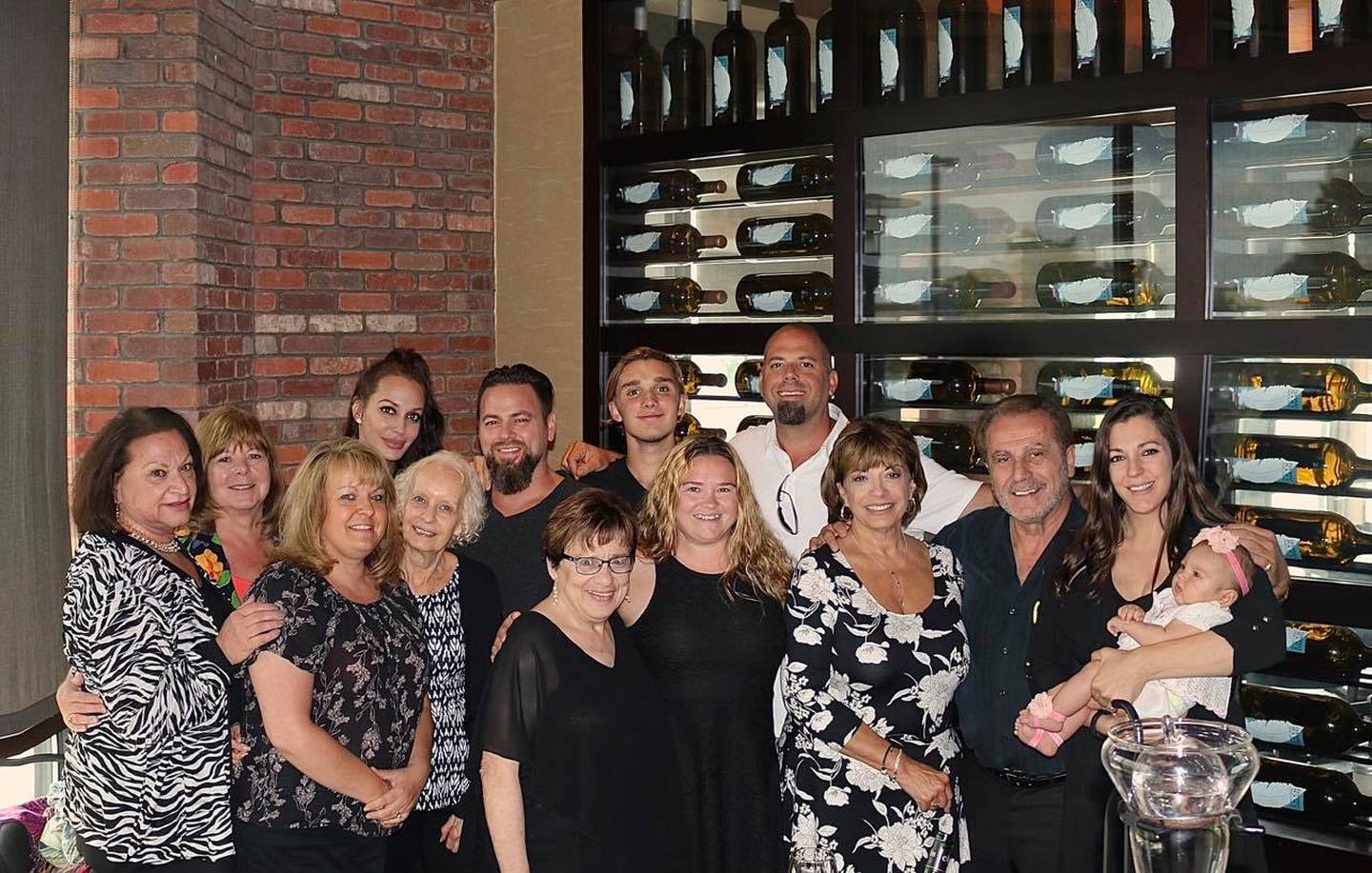 Carmel Perino of Homer Glen (in the black and white dress) celebrated her 70th birthday with loved ones.