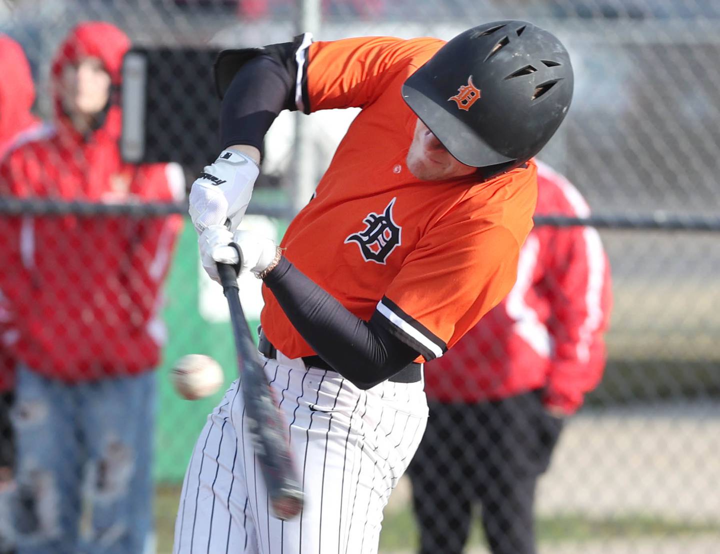 DeKalb's Jack Keck makes contact during their game against Jefferson Wednesday, April 6, 2022, at DeKalb High School.