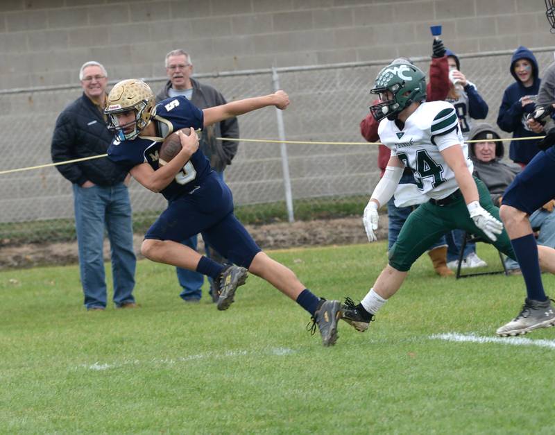 Polo's Gus Mumford (5) heads to the end zone against West Carroll during 8-man football playoff action on Saturday, Nov. 9, 2024 at Polo High School.