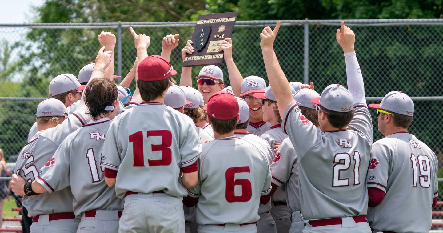 Plainfield North players celebrate their victory over Yorkville to win the Class 4A Yorkville Regional baseball final at Yorkville High School on Saturday, May 28, 2022.