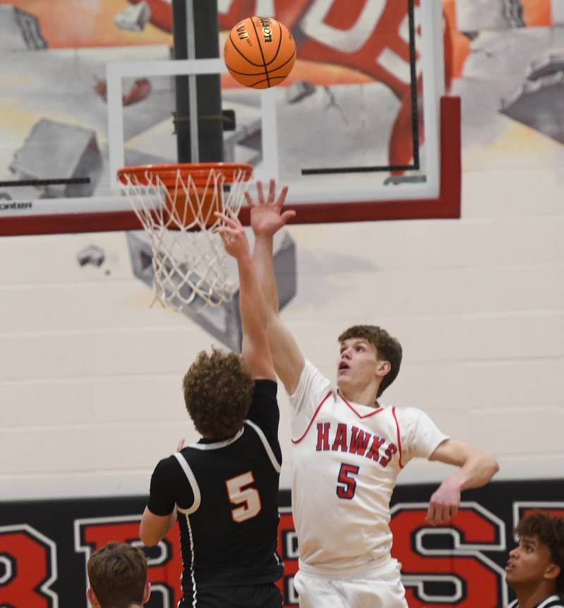 Oregon's Tucker O'Brien (5) tries to block a shot by Byron's Kole Aken (5)on Monday, Dec. 15, 2025 at the 64th Forreston Holiday Tournament at Forreston High School.