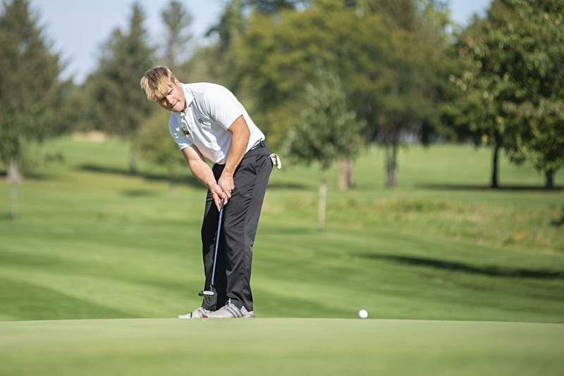 Sycamore’s Ethan Fischer putts on no.10 at Emerald Hill in Sterling for the Class AA IHSA sectional golf meet.