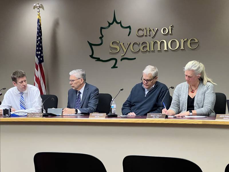 Sycamore City Manager Michael Hall talks during the City Council meeting on Feb. 3, 2025, while City Attorney Keith Foster, Mayor Steve Braser and City Clerk Mary Kalk listen.