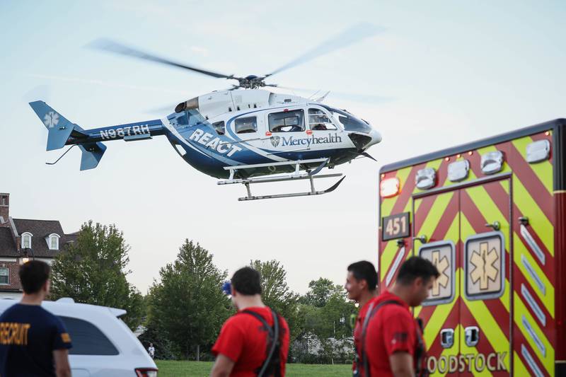 Woodstock Fire/Rescue District assist a woman who was seriously injured in a crash on Aug. 22, 2025 at the 100 block of 1st Street.