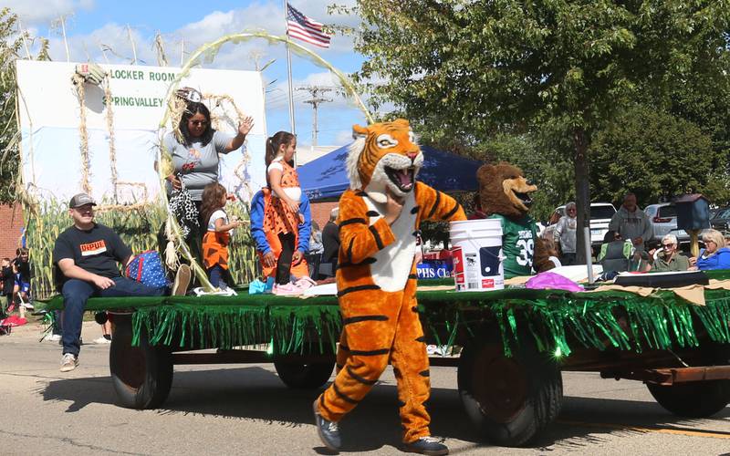 The Locker Room float, along with the Princeton Tiger and St. Bede mascots makes it's way down South Main Street during the 54th annual Homestead Festival parade on Saturday, Sept. 6, 2025 in Princeton.