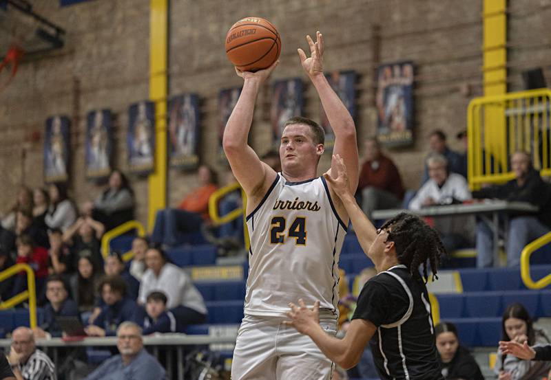 Sterling’s Lucas Austin puts up a three-point shot against Galesburg Friday, Jan. 5, 2024 at Sterling High School.