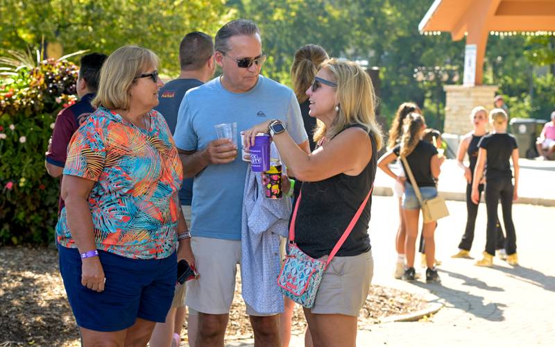Lynn Johnson along with her brother and sister-in-law Randy and Jen Johnson enjoy the day at Batavia MainStreetÕs Block Party & Taste of Batavia on Sunday, Aug 31, 2025 in Batavia.