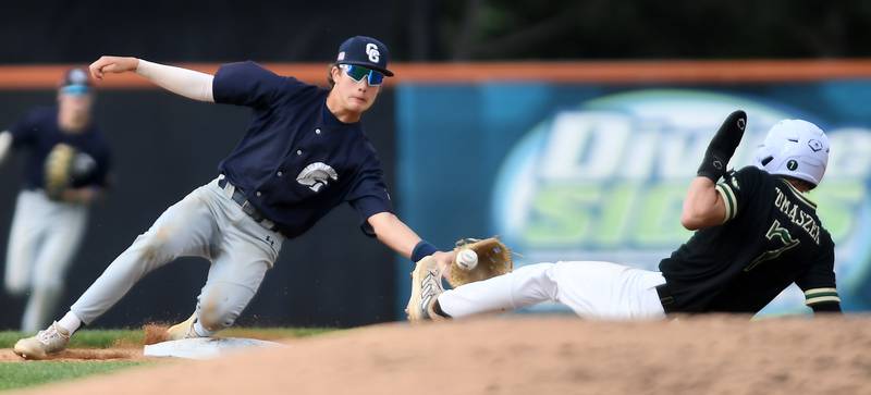 Cary-Grove second baseman Ricky Barnes tags out St. Patrick’s Thomas Tomaszek at the base during the Class 3A supersectional baseball game at Wintrust Field on Monday, June 9, 2025 in Schaumburg.