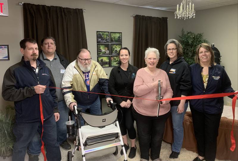 Pam Garlisch, owner of Body Styling, located at 212 Crystal St., Ste. B in Cary, celebrates the grand opening of Body Styling, LLC with a Ribbon Cutting Ceremony.  Pam is joined by the staff and board members of the Cary-Grove Area Chamber of Commerce.