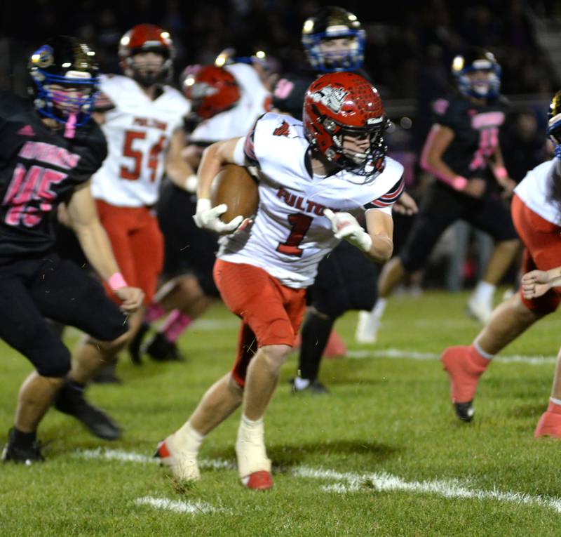 Fulton's Braedon Meyers (1) runs with the ball against Durand-Pecatonica' during NUIC action on Friday, Oct. 11, 2024 at Pecatonica.