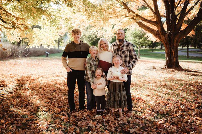 Caleb Outerbridge, left, stands with his parents and siblings in this family photo. Caleb is hospitalized with a rare autoimmune disorder, and his family will be the subject of the Feb. 26 Crunch for a Cause fundraiser at the Bradley Taco John's.