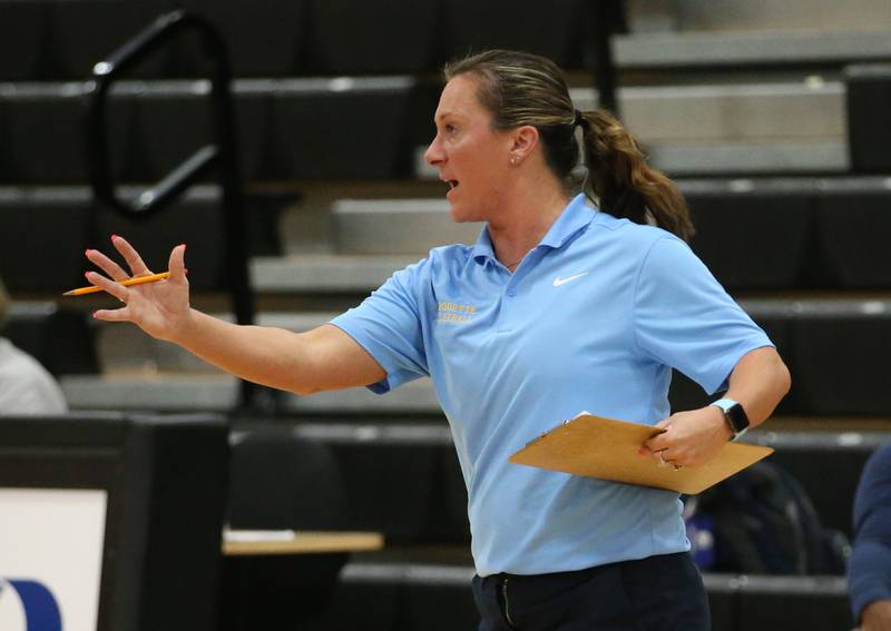 Marquette head volleyball coach Mindy McConnaughhay coaches her team against Putnam County on Thursday, Sept 7, 2023 at Putnam County High School.