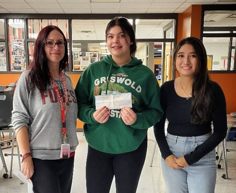 Pictured are YHS KeyClub members accepting a generous $1,000 donation from the Yorkville American Legion.