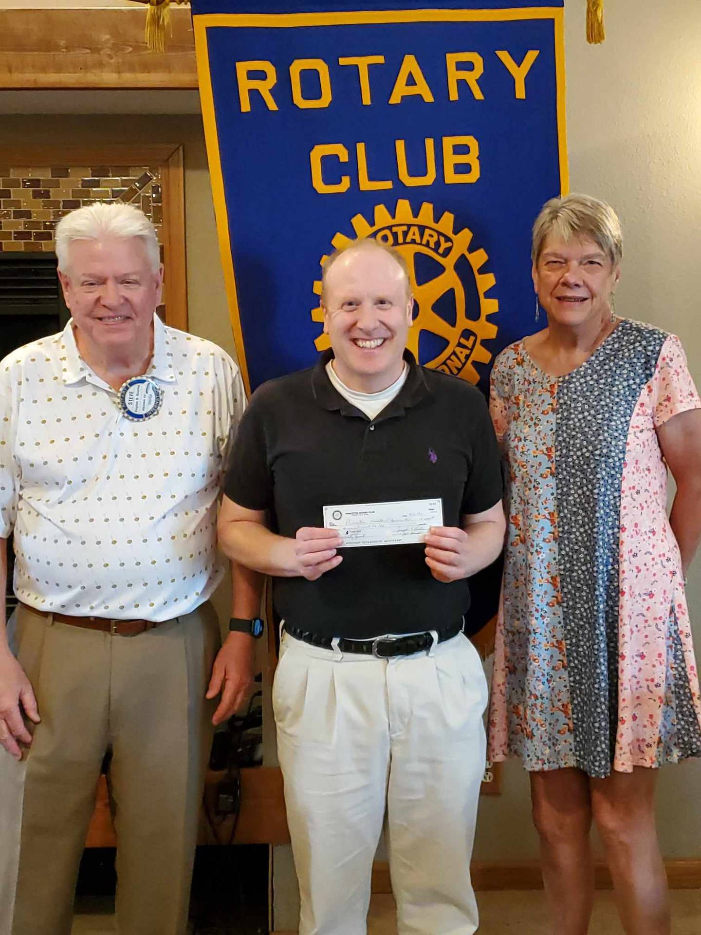 Pictured (from left) are Steve Bouslog, vice president; Ryan Sutton with the Ministerial Association and Joanne Sheldon, Grants/Scholarship Committee.