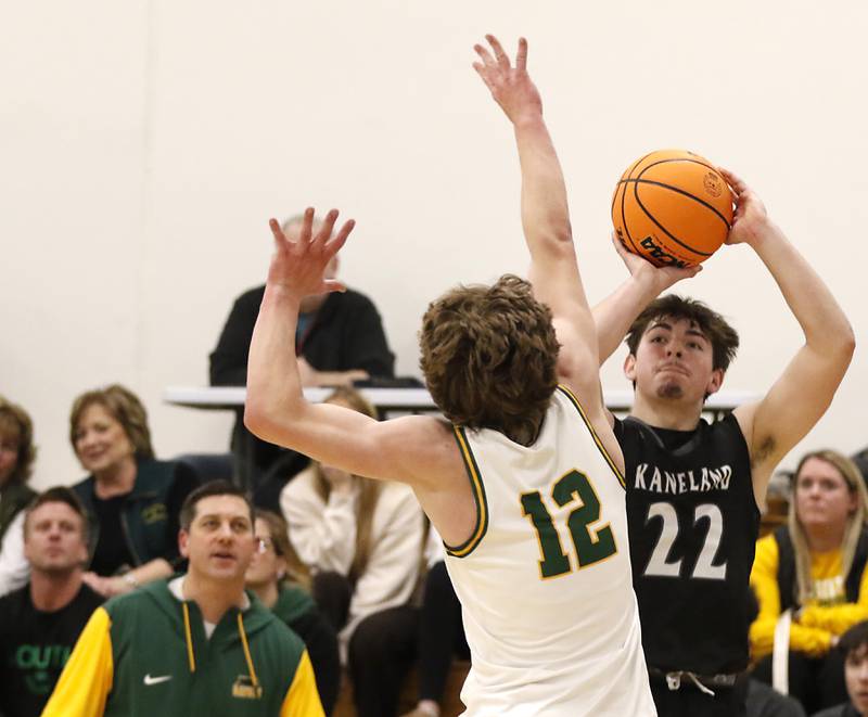 Kaneland's Brayden Seaton shoots the ball over Crystal Lake South's Vincent Santarelli during the IHSA Class 3A Rochelle Sectional championship basketball game on Friday, March 7, 2025, at Rochelle High School.