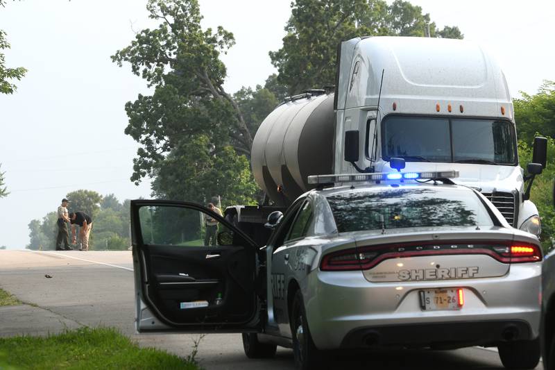 Ogle County Sheriff Brian Van Vickle along with his deputies along with Illinois State Troopers perform an accident reconstruction in the 4400 block of Illinois Route 2 on Wednesday after Patricia A. Jones, 86, was struck by a semi-truck while crossing the state highway near her home. Jones was airlifted to a Rockford Hospital and the road remained closed for 2 hours while the investigation was performed.