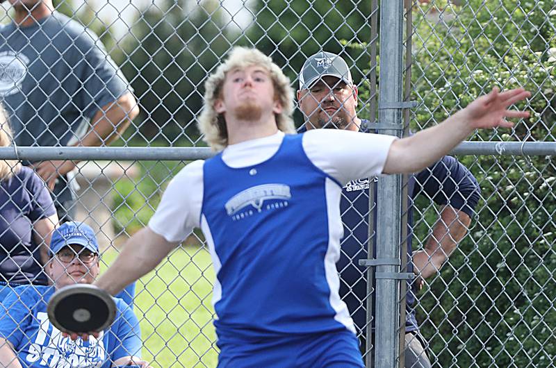 Princeton's Ian Morris throws the discus in Friday's TRAC Meet at Princeton.