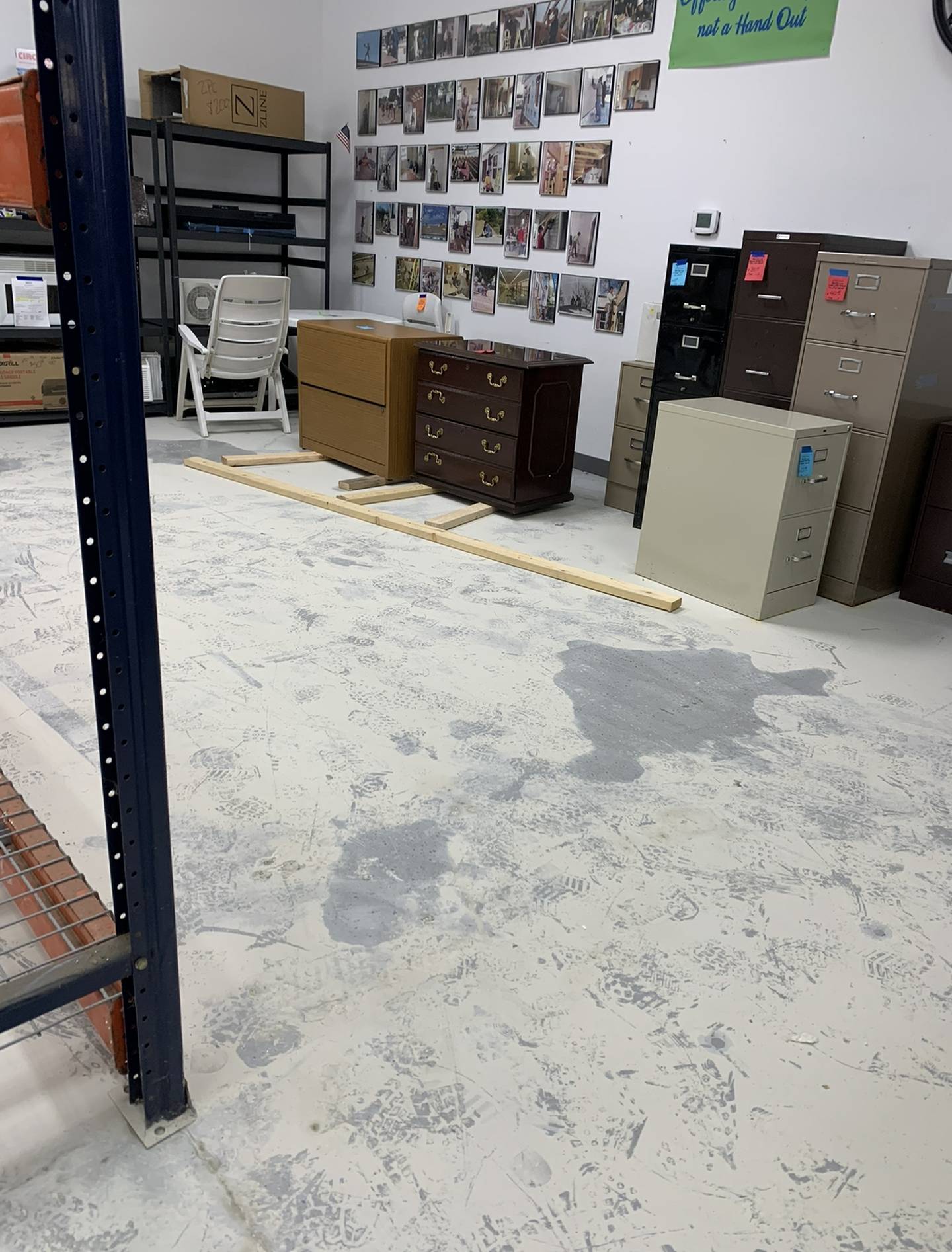 A build up of silt caused by flooding at Habitat for Humanity's ReStore on Thursday, Nov. 17, 2022, in Woodstock. The store is closed until further notice due to flooding from a main break.