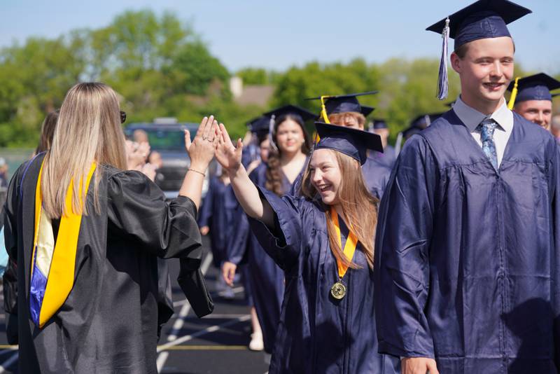 Members of the Cary-Grove High School class of 2026 celebrate their commencement on May 16, 2026.
