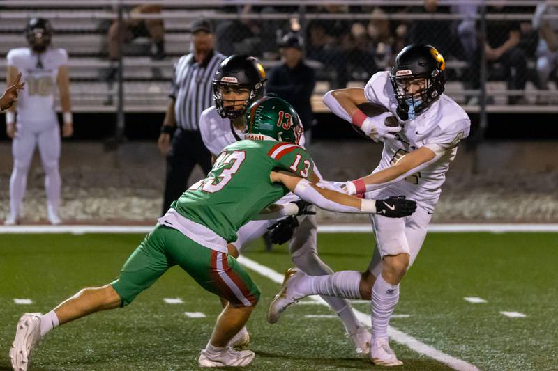 Aiden Wyzard of Sycamore pushes Gio Legrenzi of L-P on Friday, October 11, 2024 at Howard Fellows Stadium in LaSalle.