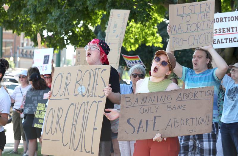 Protesters chant Friday, June 24, 2022, during a rally for abortion rights in front of the DeKalb County Courthouse in Sycamore. The group was protesting Friday's decision by the Supreme Court to overturn Roe v. Wade, ending constitutional protections for abortion.