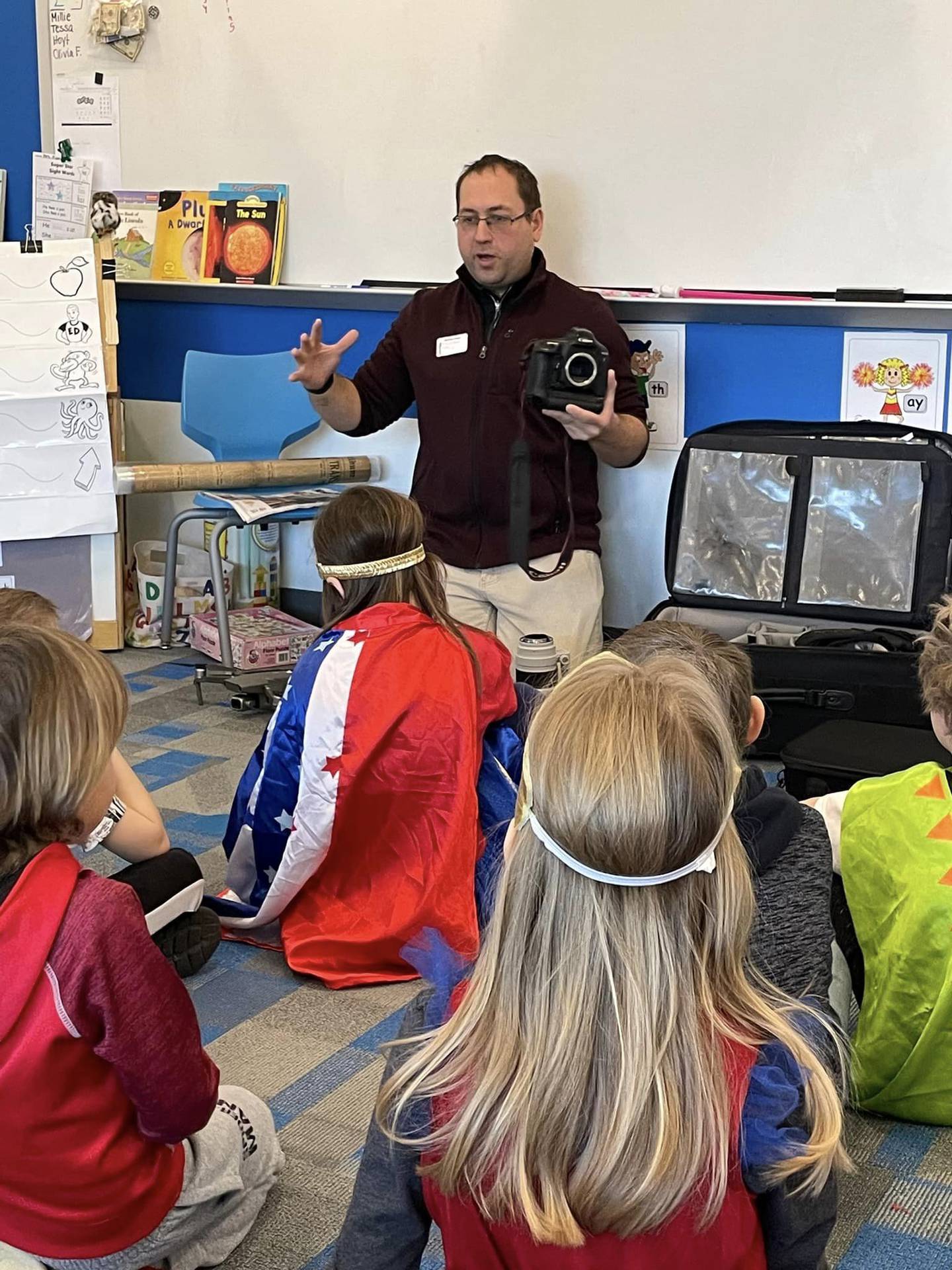 La Salle News Tribune and Ottawa Times photo editor Scott Anderson visited Mrs. Karin Kummer's classroom to read and present his photography gear during Read Across America Week at Waltham School on Tuesday, Feb. 28, 2023 in Utica. Read Across America celebrates students’ freedom to read, learn, grow, and dream.