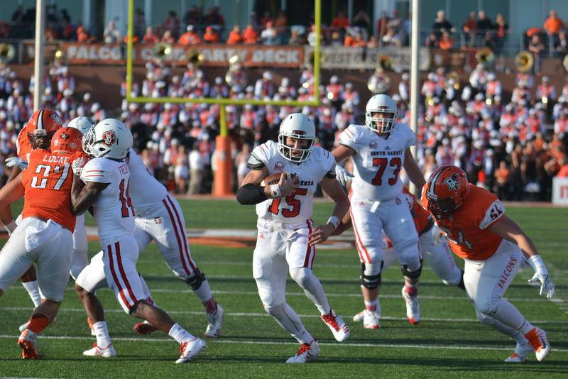 South Dakota quarterback Chris Streveler (center), a Marian Central grad from Crystal Lake, will work out for the Bears on Friday. Streveler, who finished second in voting for the Walter Payton Award this past college season, is hoping to impress NFL teams ahead of this month's draft.