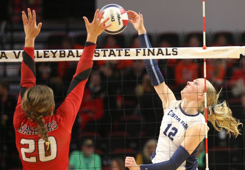 Cissna Park's Kendyl Neukomm returns a serve from Calhoun during the Class 1A State semifinal game on Friday, Nov. 15, 2024 at CEFCU Arena in Normal.