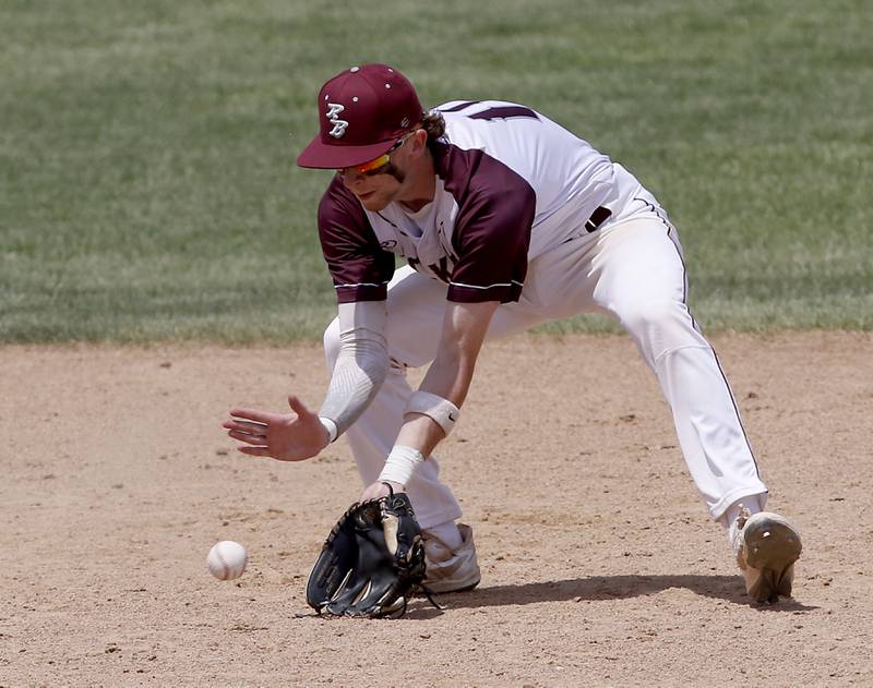 Richmon-Burton’s Connor Wallace fields the ball during a IHSA Class 2A supersectional baseball game between Richmond-Burton and Timothy Christian at the Rockford Rivets Stadium in Rockford.