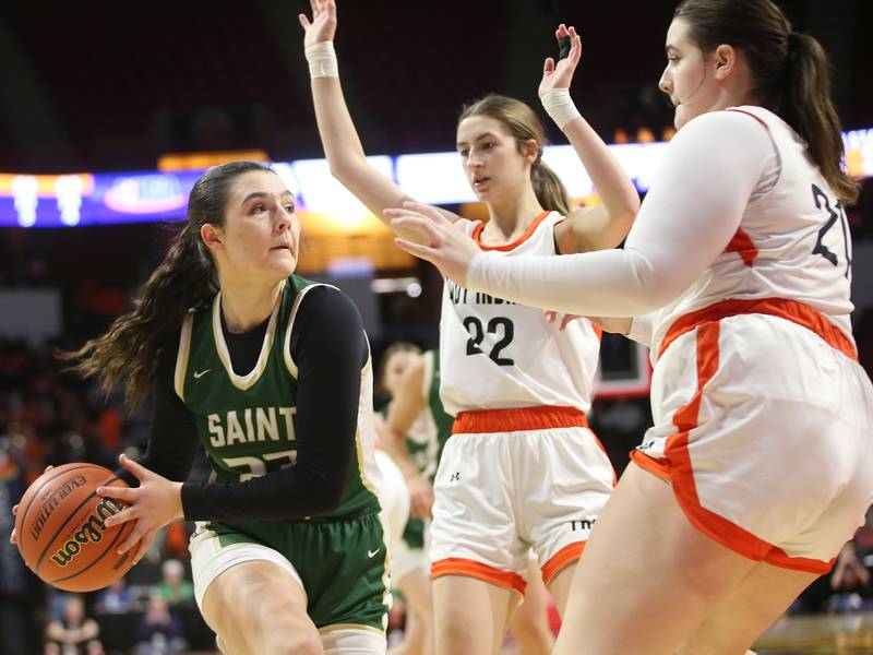 St. Bede's Ali Bosnich gets stuck in the lane by Altamont defenders Kylie Osteen and teammate Kaylee Lurkins during the Class 1A third-place game on Thursday, Feb. 29, 2024 at CEFCU Arena in Normal.