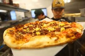 Algonquin TikToker creates special pizza for Pickle Haus