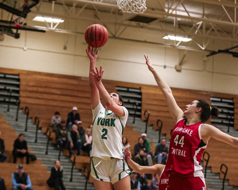 York's Anna Filosa (2) puts in a lay up during basketball game between Hinsdale Central at York. Dec 8, 2023.