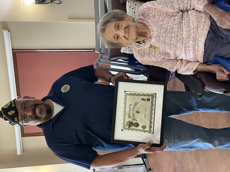 (Left to right); DeKalb American Legion Post 66 commander Manuel Olalde and Myrtle Lusiak